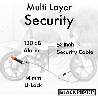 The image displays a Blackstone security product that emphasizes multi-layer security. It features a 14 mm U-Lock paired with a 52-inch security cable and is equipped with a 130 dB alarm system. The visual is likely designed to highlight the strength and versatility of the security system, suggesting it can secure a bike with multiple locking options and an alarm for added protection. The background shows a blurred image of a bicycle, which aligns with the product's intended use